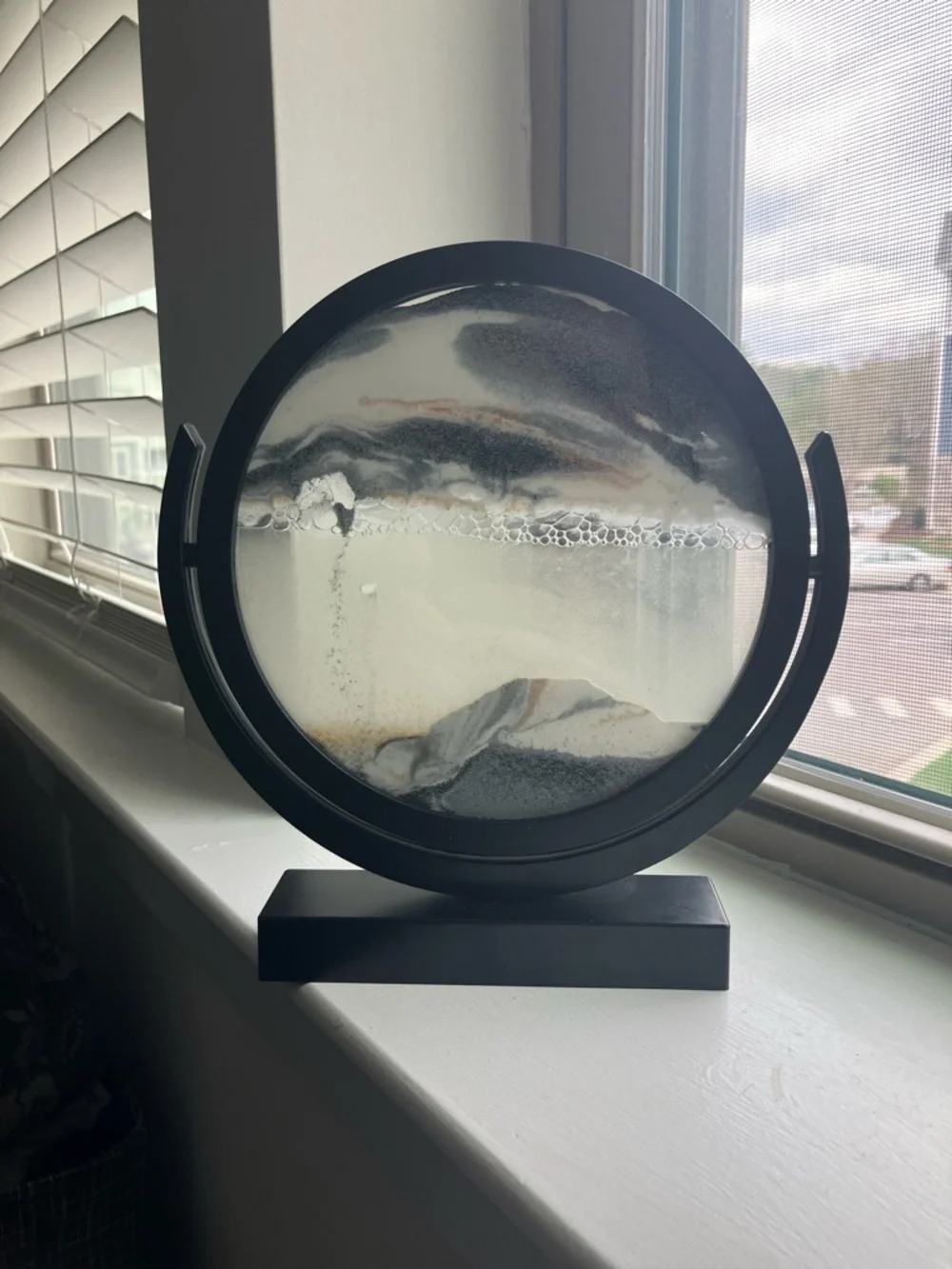 Round Sand Art Display with Black Frame and Gold & Black Sand